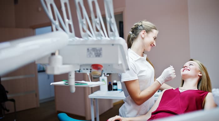 woman in dental chair - Forestbrook Dental